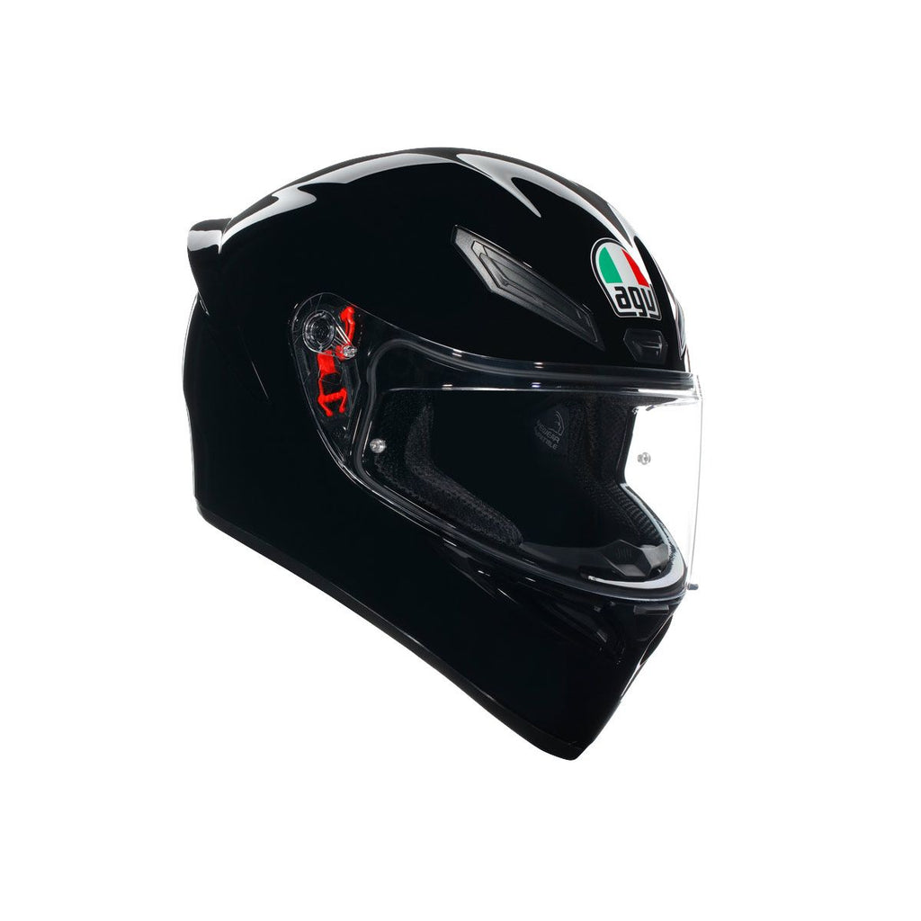Black motorcycle helmet with clear visor on a white background
