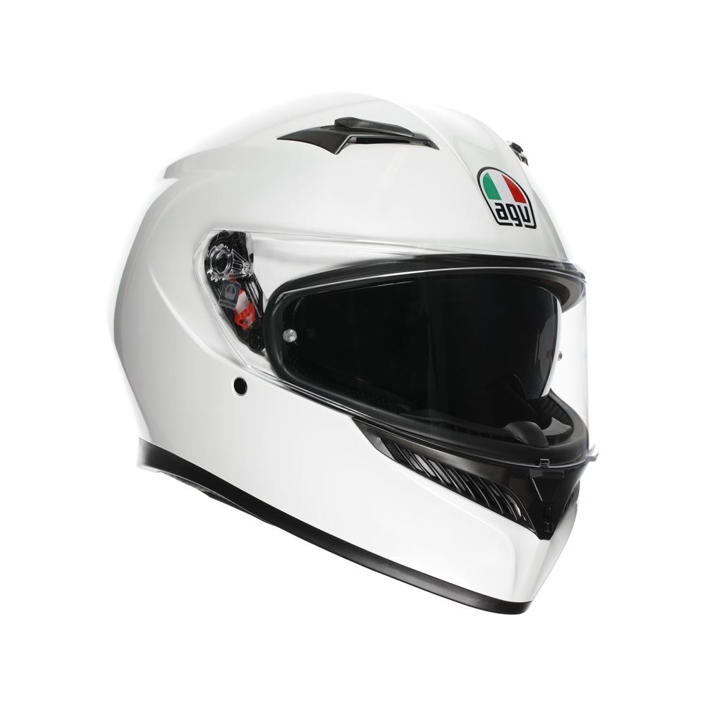 White motorcycle helmet with clear visor on a white background