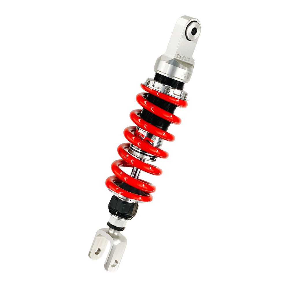 Motorcycle shock absorber with red coil spring on a white background