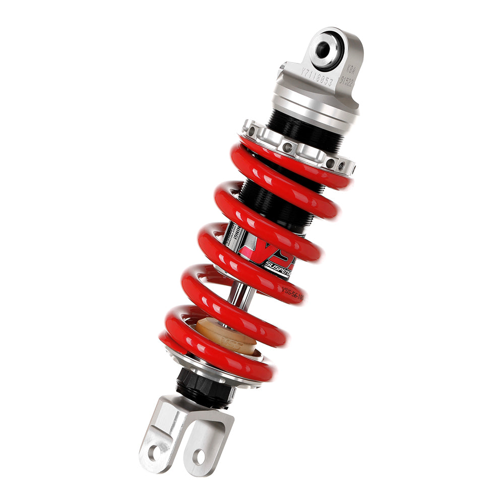 Red shock absorber with silver top and black base on a white background