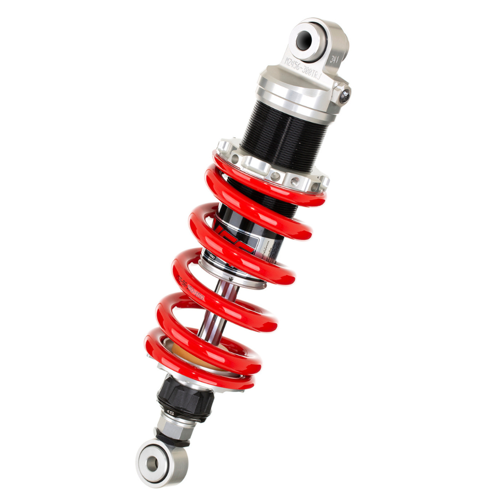 Motorcycle shock absorber with red spring on a white background