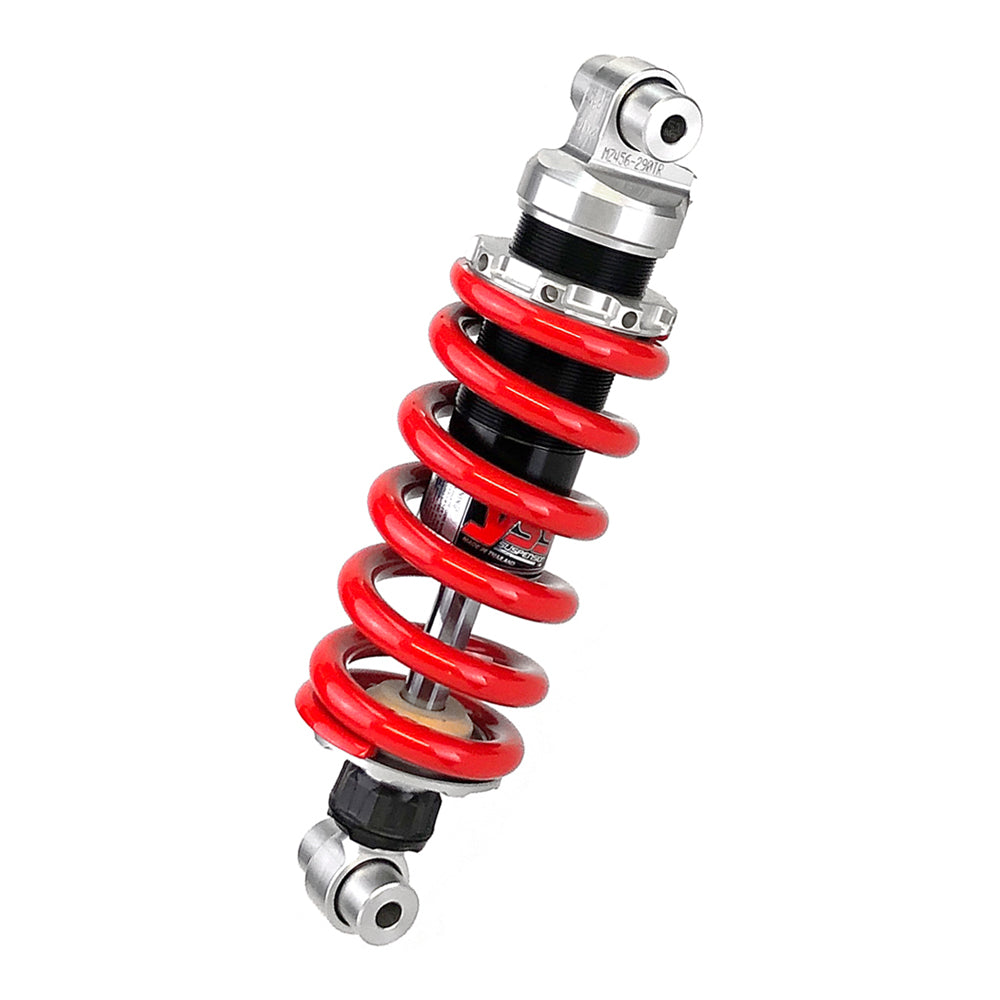 Motorcycle shock absorber with red coil spring on a white background
