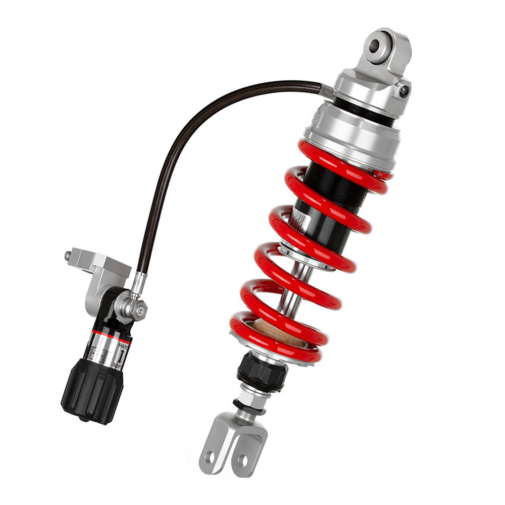 Motorcycle shock absorber with red spring on a white background